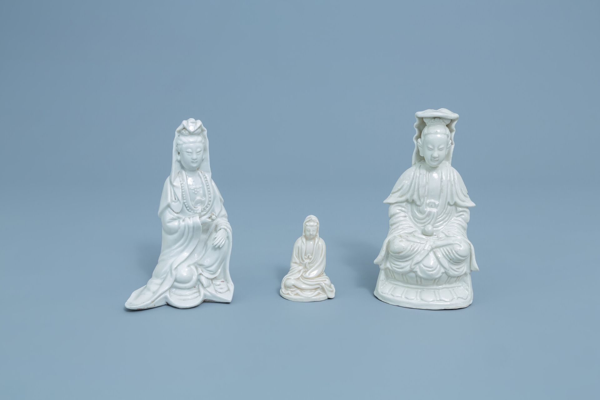 Three Chinese Dehua blanc de Chine figures of Guanyin, Kangxi and later