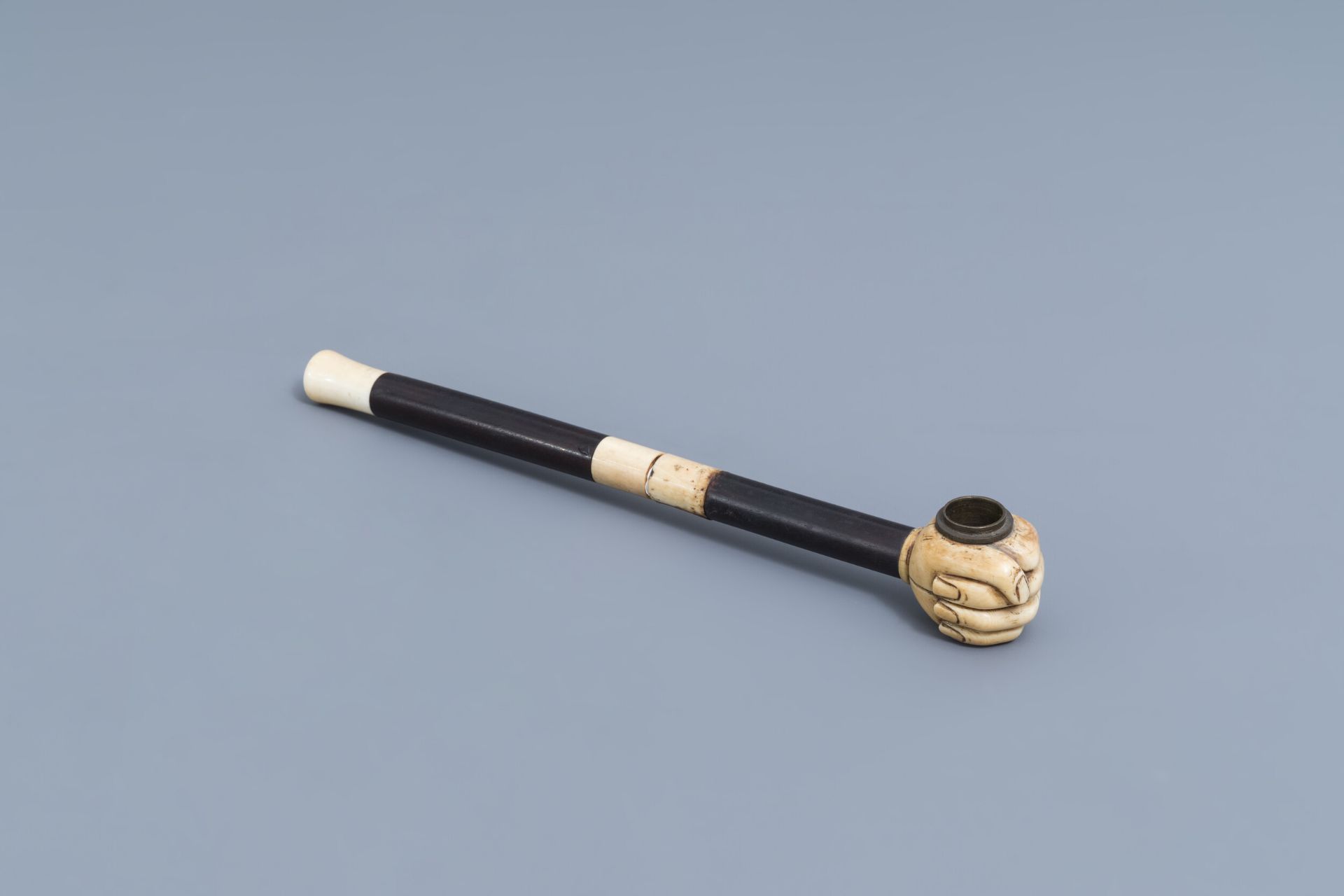 A Chinese hardwood and ivory travel opium pipe, 19th C.
