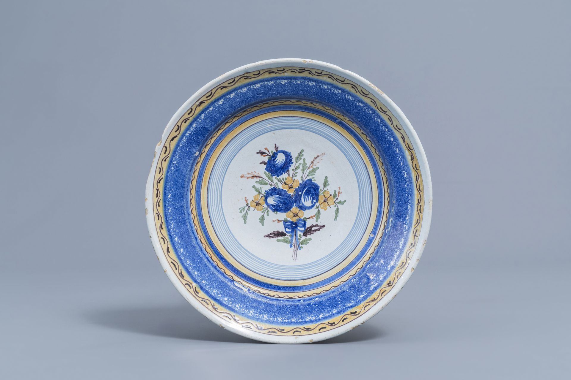 Five polychrome Brussels faience plates with floral design, 18th/19th C. - Image 10 of 12