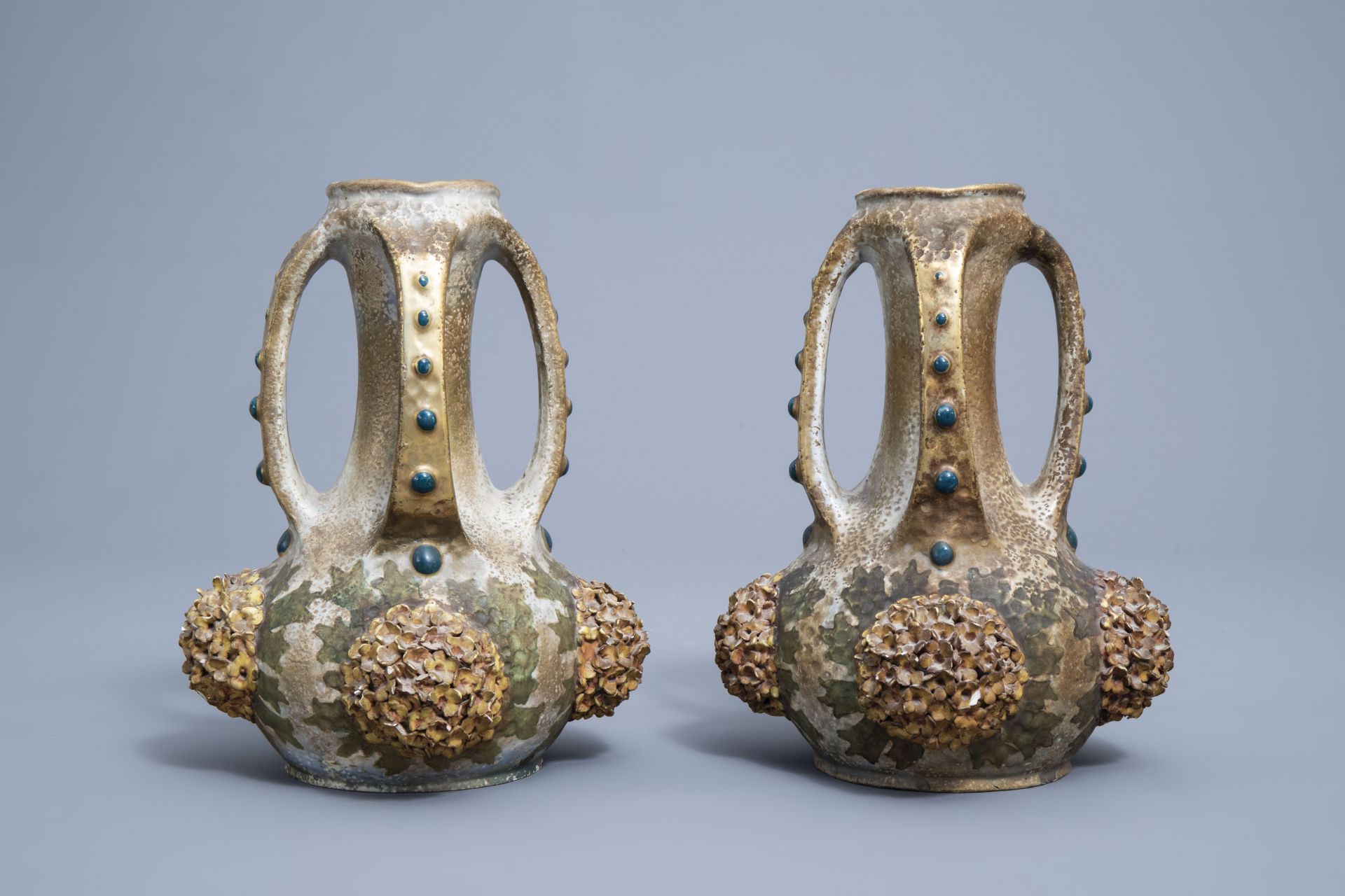 A pair of polychrome, gilt and iridescent Amphora Austria Art Nouveau vases, early 20th C. - Image 7 of 20