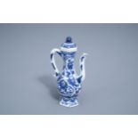 A Chinese blue and white ewer and cover with floral design, Kangxi