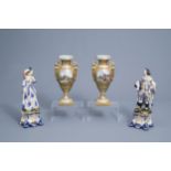 A pair of French Paris porcelain noble figures and a pair of gilt 'Empire' vases, 19th/20th C.