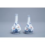 A pair of Japanese Kakiemon doll's house miniature vases with a playing child, Edo, 17th/18th C.