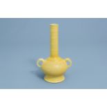 A Chinese monochrome yellow glazed bottle vase, Yongzheng mark, 19th/20th C.