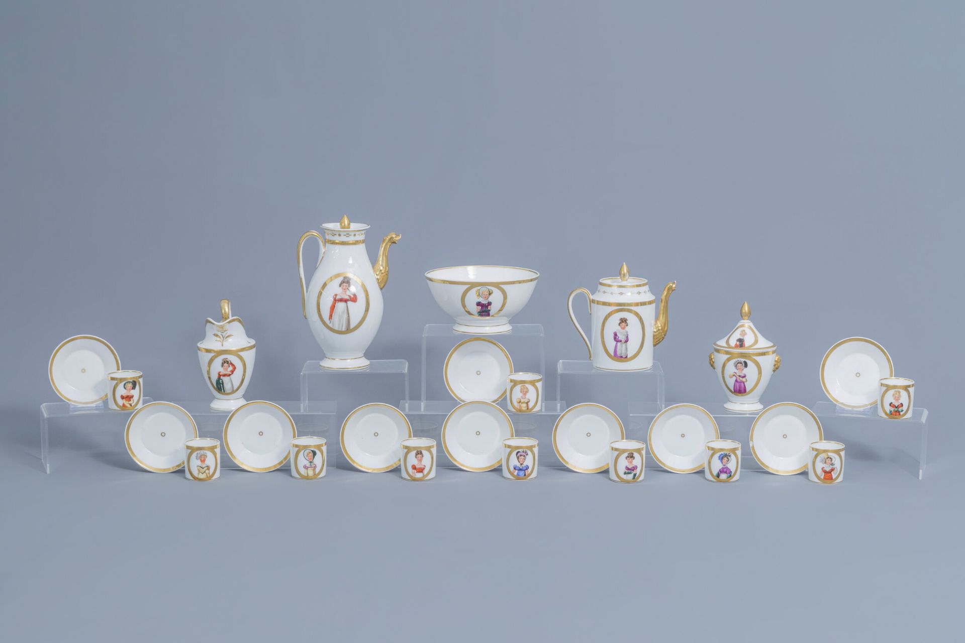 A 25-piece Paris porcelain coffee and tea service with First French Empire ladies portraits, 19th C.