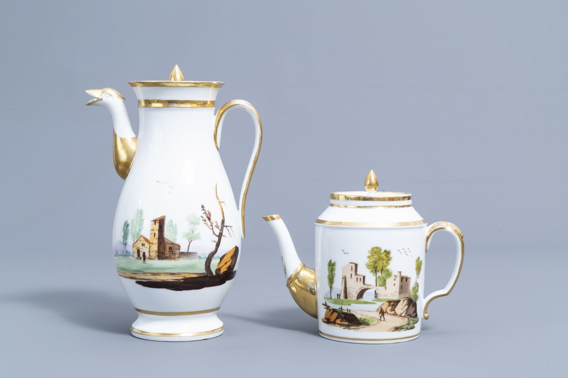 A 21-piece Paris polychrome and gilt porcelain coffee and tea service with landscapes, 19th C. - Image 7 of 46