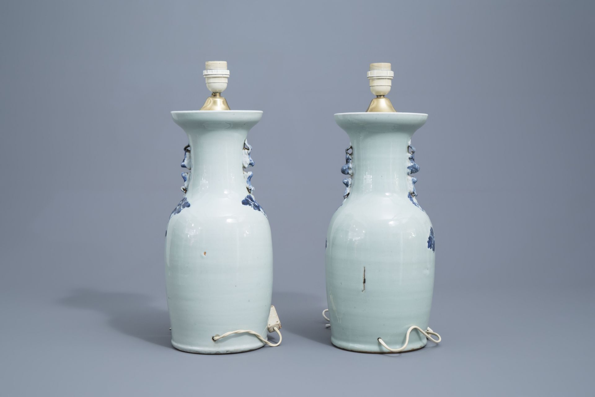 A Chinese blue and white landscape vase and four celadon vases, 19th/20th C. - Image 10 of 13