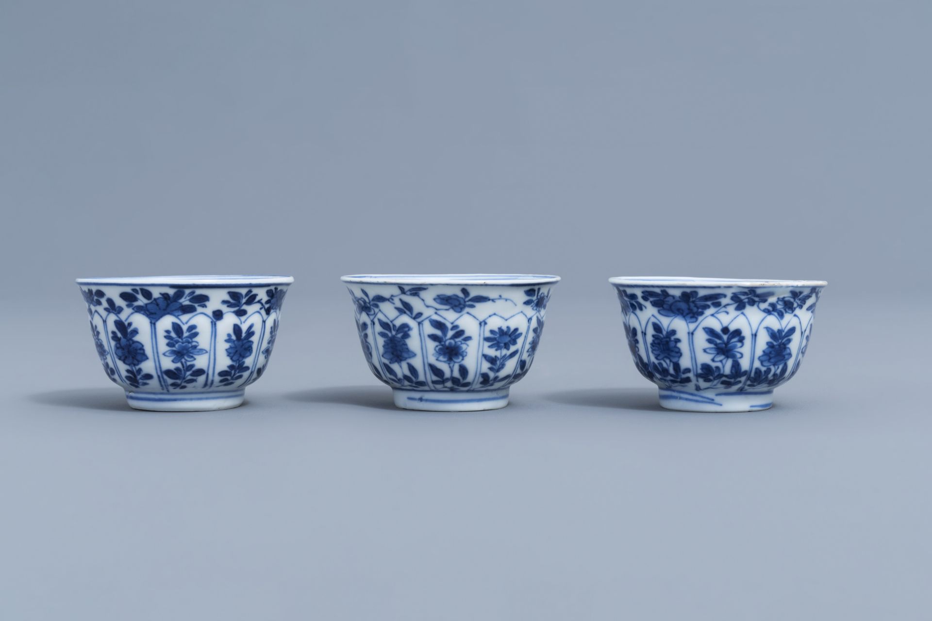 Three Chinese blue and white cups and saucers with floral design, Kangxi - Image 4 of 9