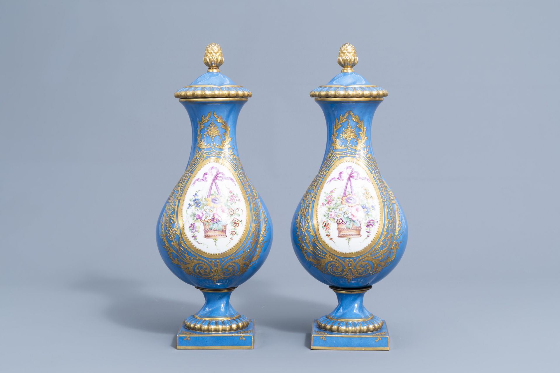 A pair of French 'bleu celeste' Svres manner vases and an Empire style centrepiece, 19th/20th C. - Image 4 of 28