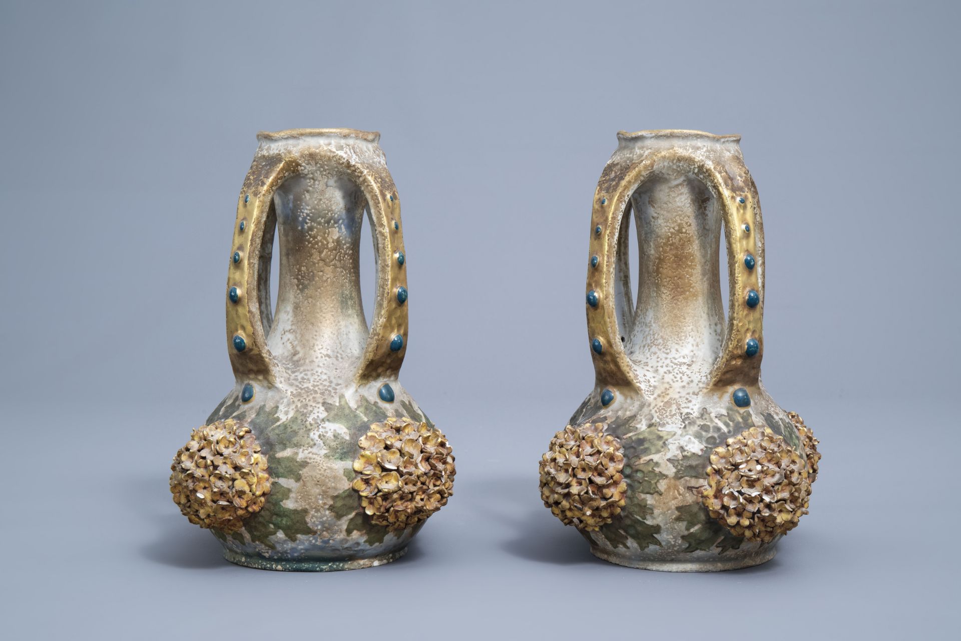 A pair of polychrome, gilt and iridescent Amphora Austria Art Nouveau vases, early 20th C. - Image 11 of 20