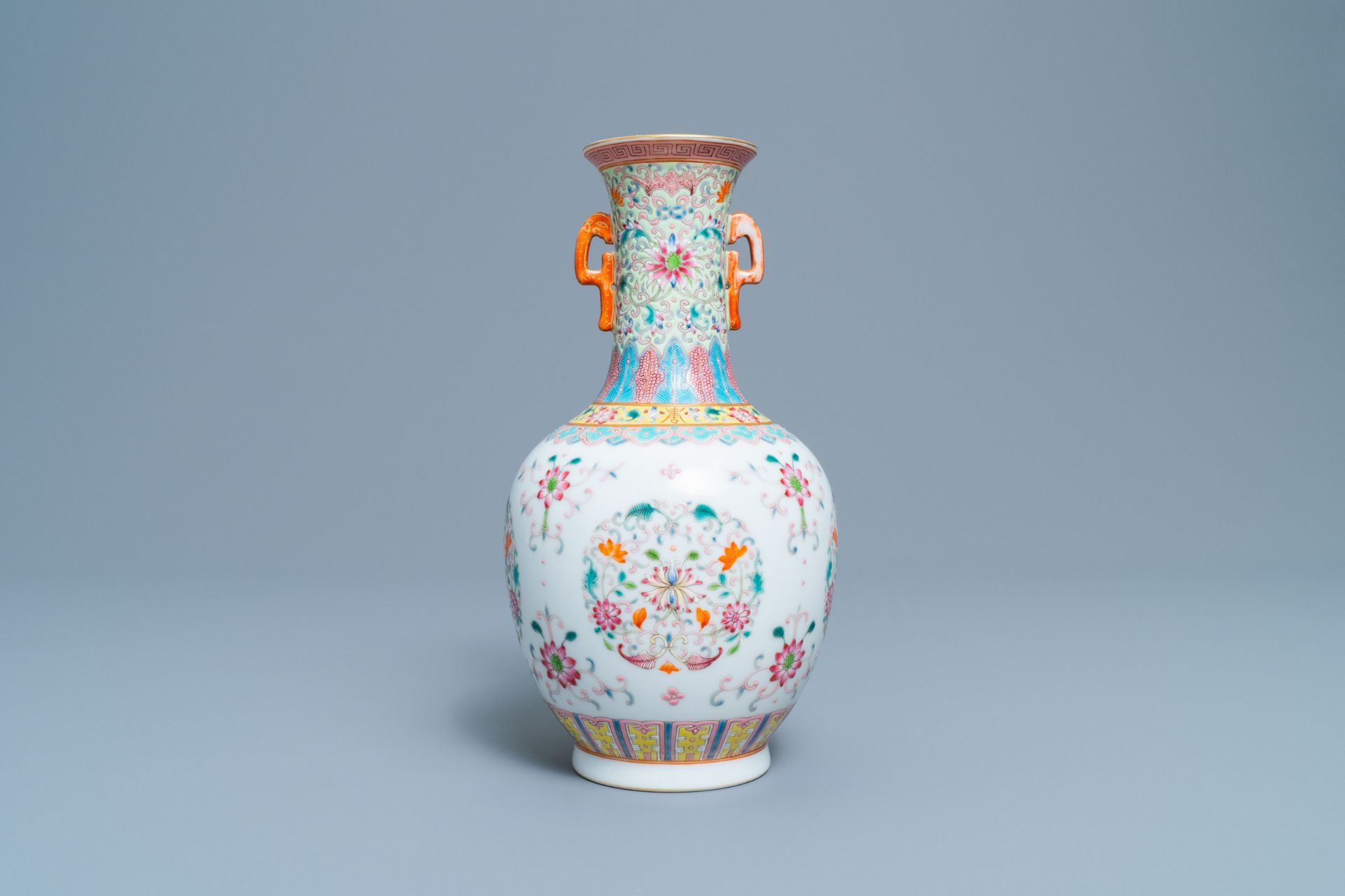 A Chinese famille rose vase with floral design, Qianlong mark, Republic, 20th C. - Image 3 of 6