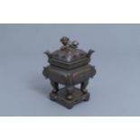 A Chinese inlaid bronze lozenge shaped incense burner and cover on stand, 19th C.