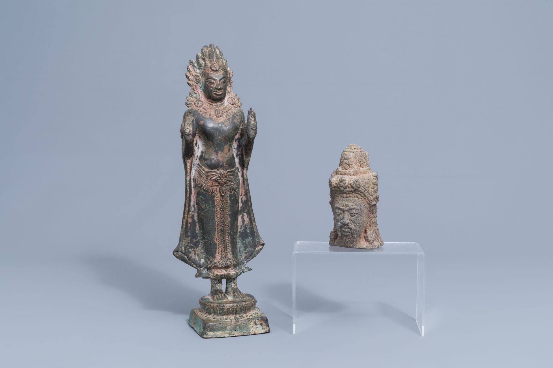 A lava stone scholar's head and a bronze figure of a Buddha, Southeast Asia, 19th/20th C. - Image 2 of 13