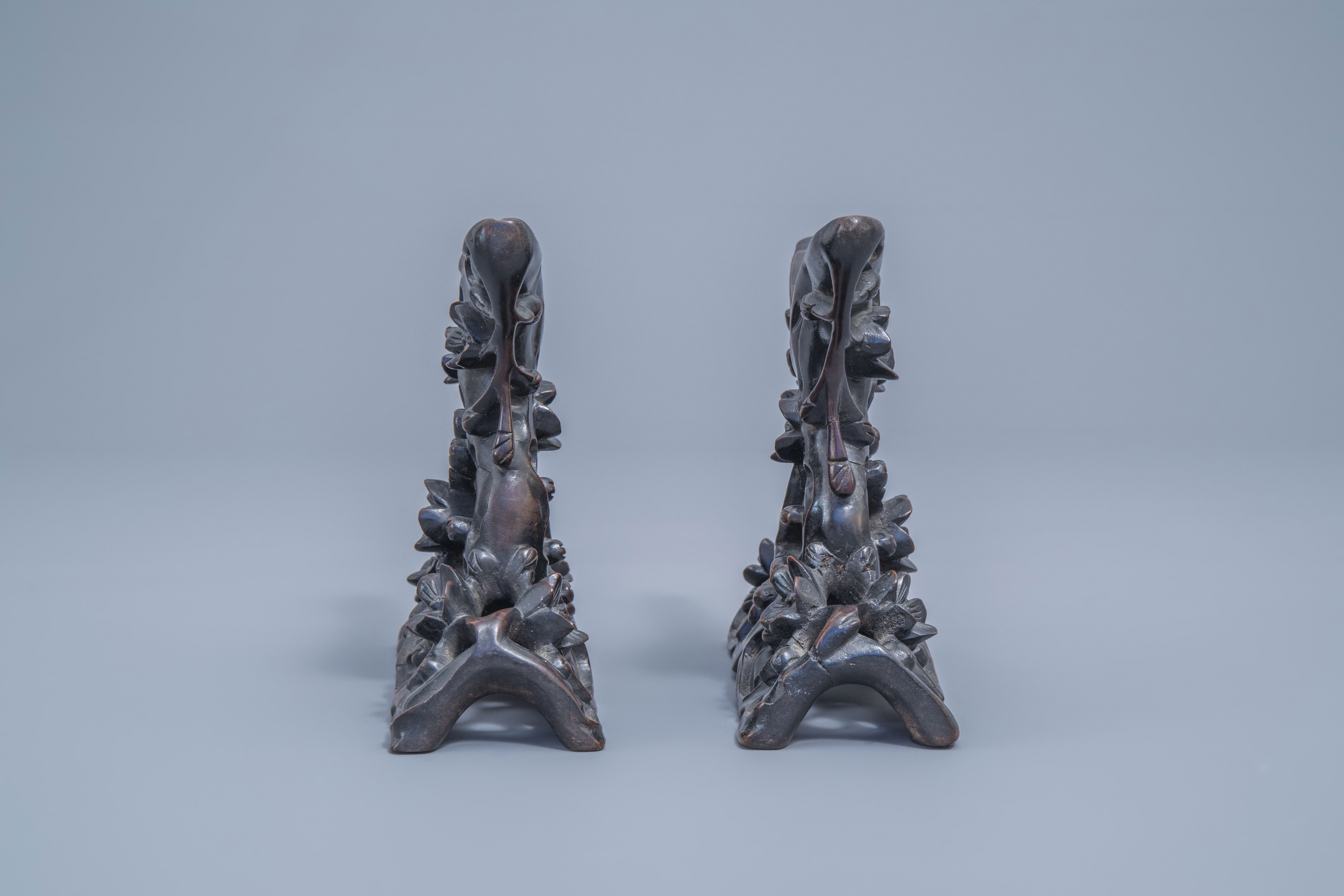 A pair of Chinese carved mother-of-pearl shells on wooden stands, 19th C. - Image 5 of 11