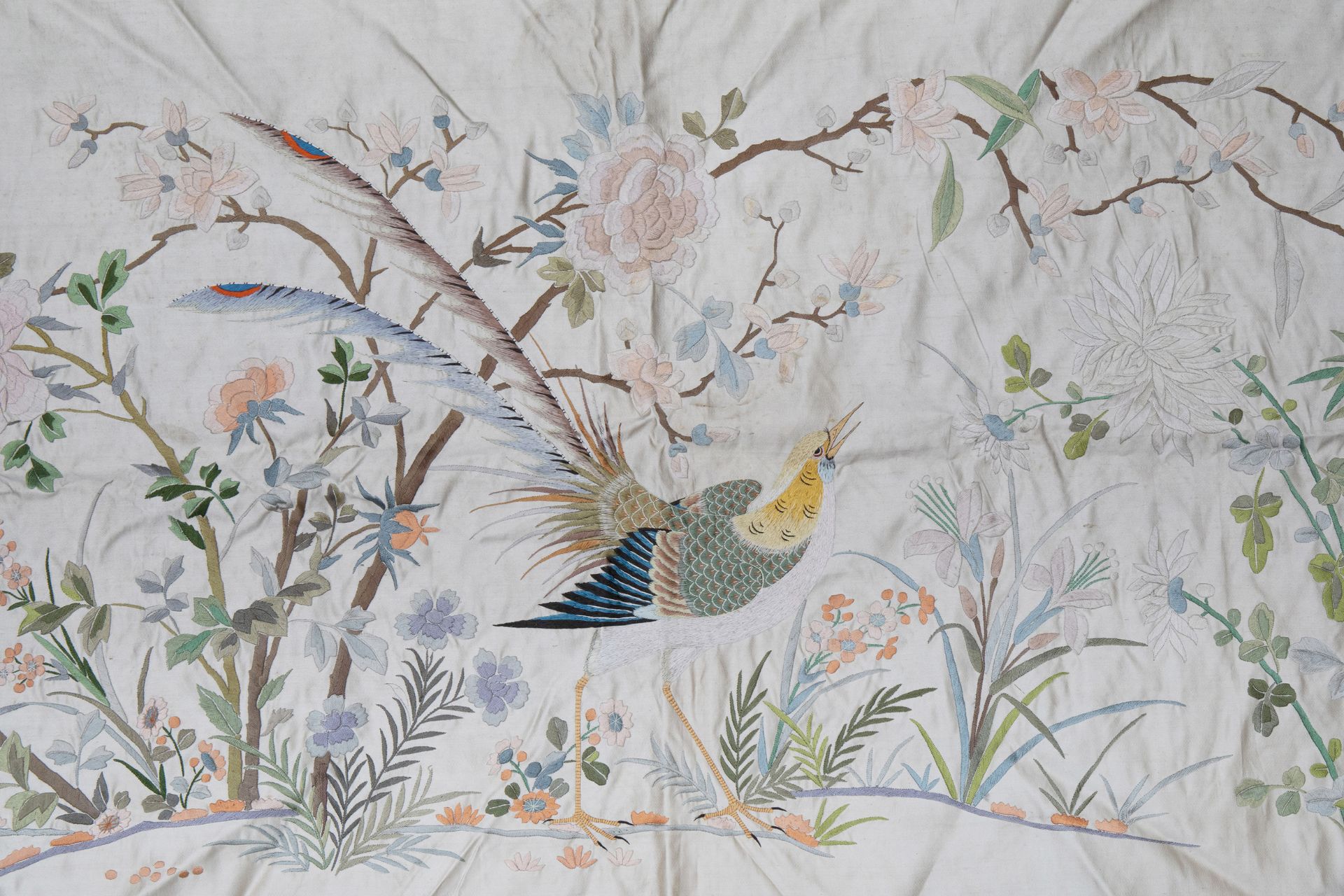 A Chinese horizontal silk embroidery with birds and a butterfly among flower branches, 19th C. - Image 4 of 5