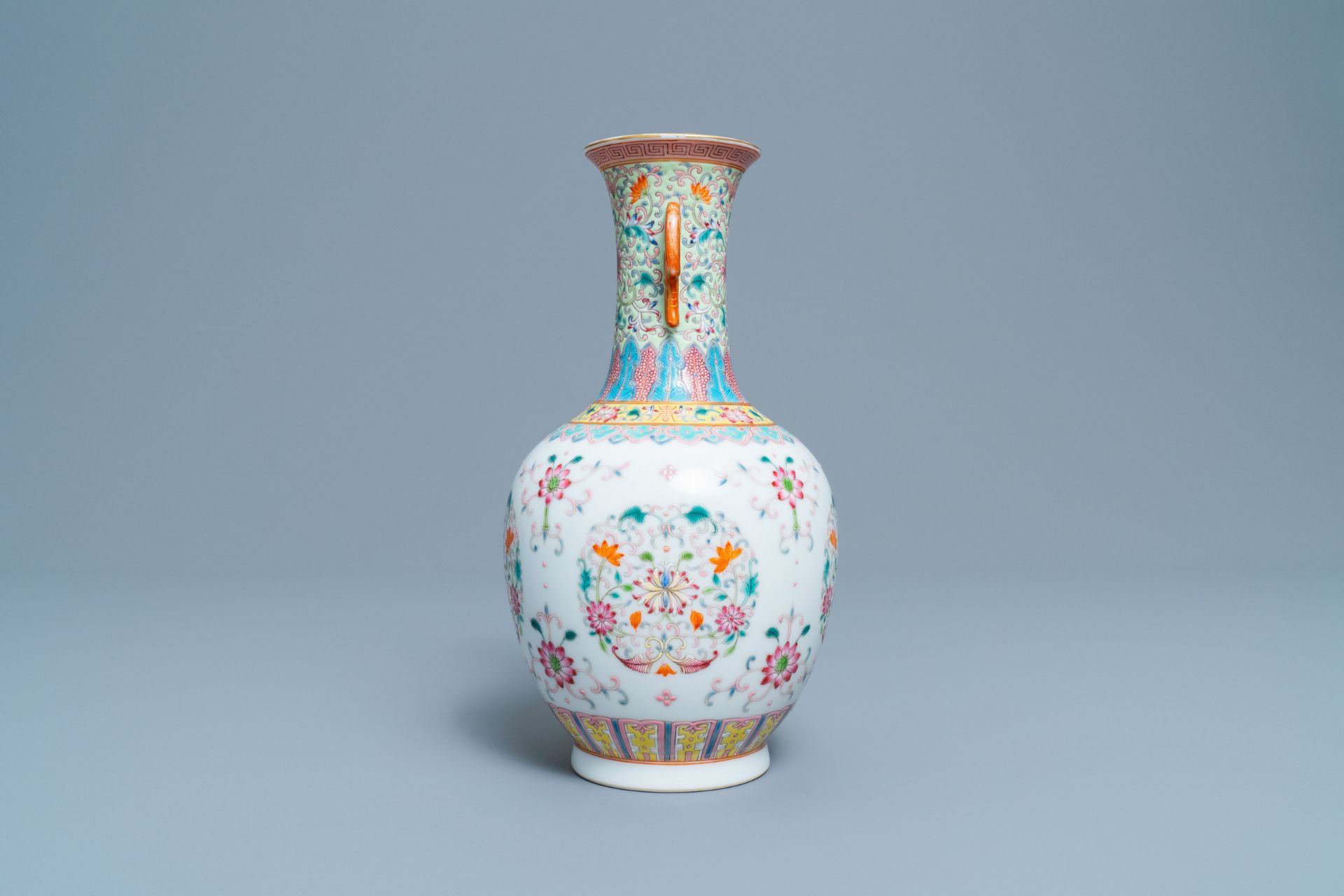 A Chinese famille rose vase with floral design, Qianlong mark, Republic, 20th C. - Image 2 of 6