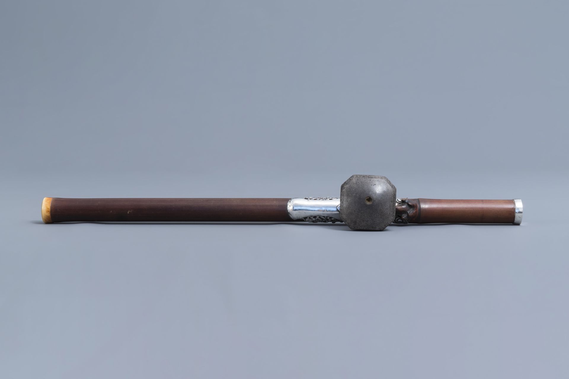 A Chinese bamboo opium pipe with silver saddle, ivory mouthpiece and stoneware damper, 19th C. - Image 5 of 10