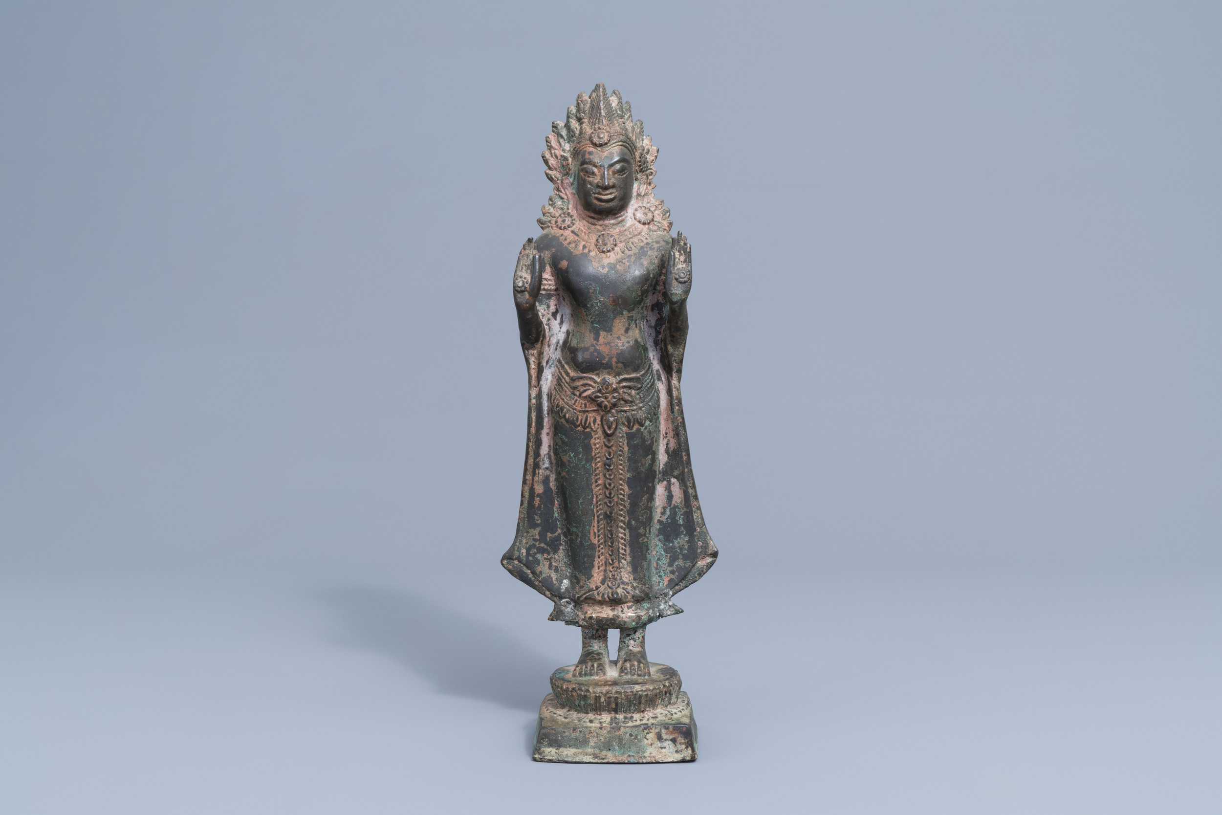 A lava stone scholar's head and a bronze figure of a Buddha, Southeast Asia, 19th/20th C. - Image 3 of 13