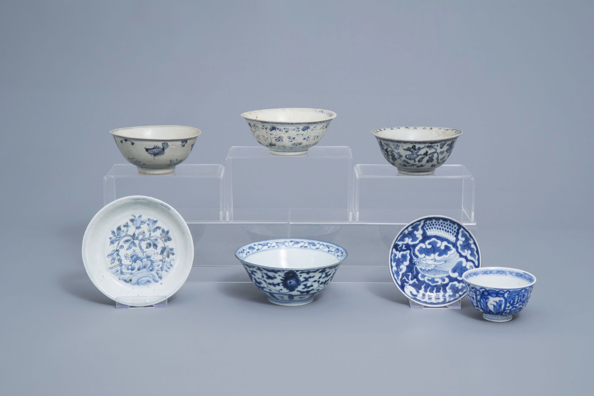 A varied collection of Chinese blue and white bowls and saucers, Ming and later