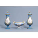 A pair of French 'bleu celeste' Svres manner vases and an Empire style centrepiece, 19th/20th C.