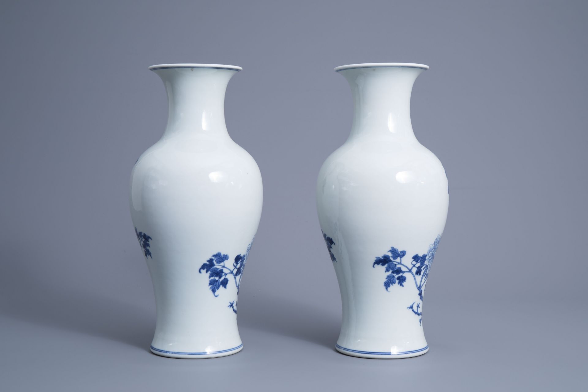 A pair of Chinese blue and white 'phoenix' vases, Republic, 20th C. - Image 3 of 6