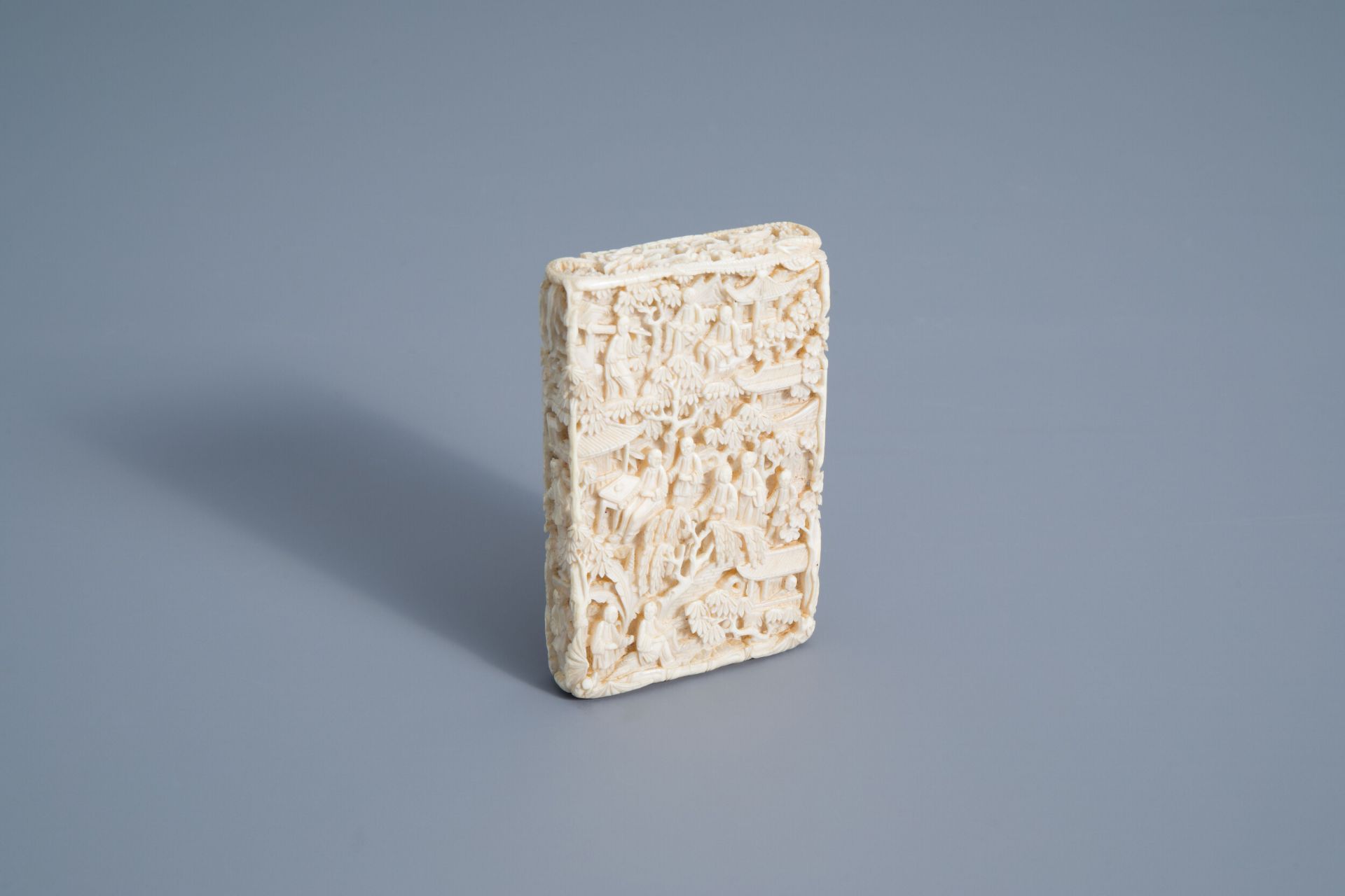 A Chinese richly carved ivory card case, Canton, 19th C.