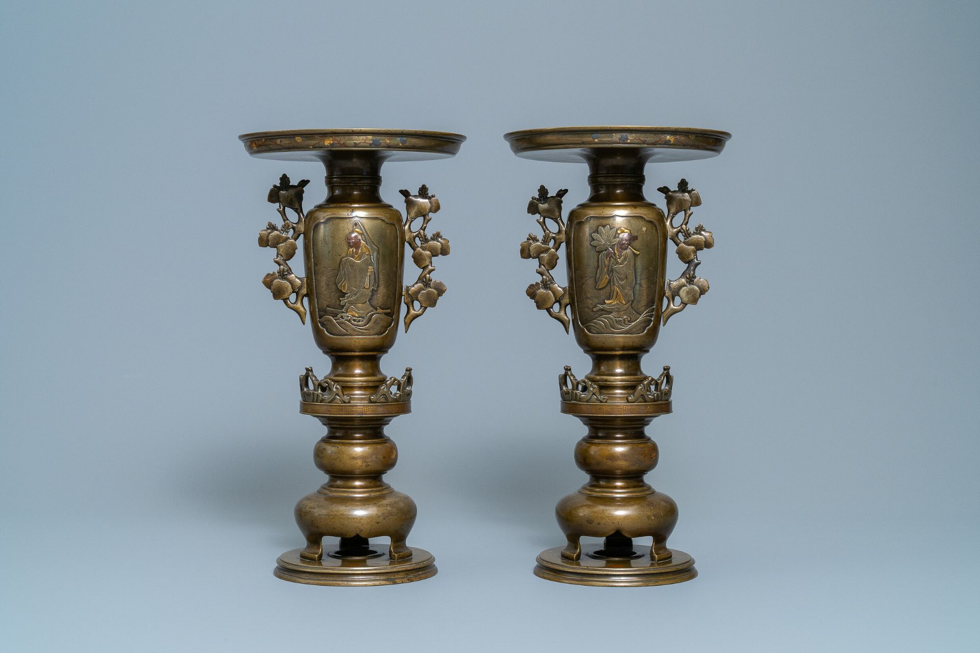 A pair of Japanese gold, silver and copper inlaid bronze usubata vases, Meiji, 19th C.