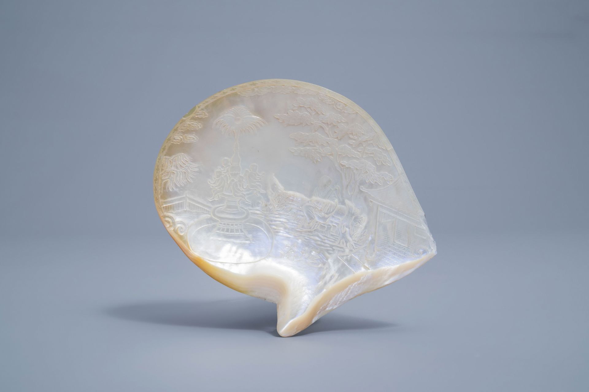 A pair of Chinese carved mother-of-pearl shells on wooden stands, 19th C. - Image 10 of 11