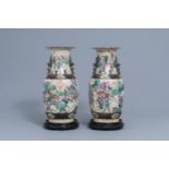 Two Chinese Nanking crackle glazed famille rose vases with warrior scenes, 19th/20th C.