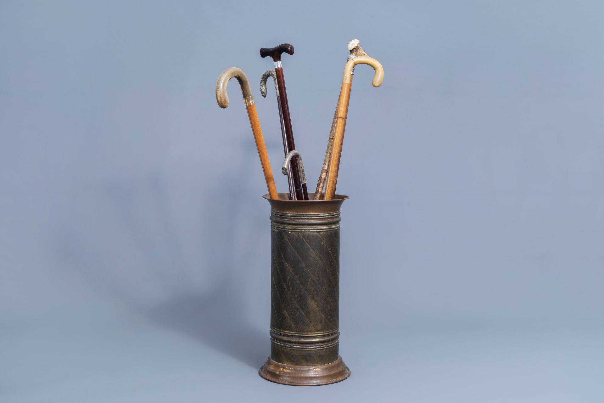 A varied collection of seven walking sticks with accompanying stand, 20th C. - Image 2 of 21