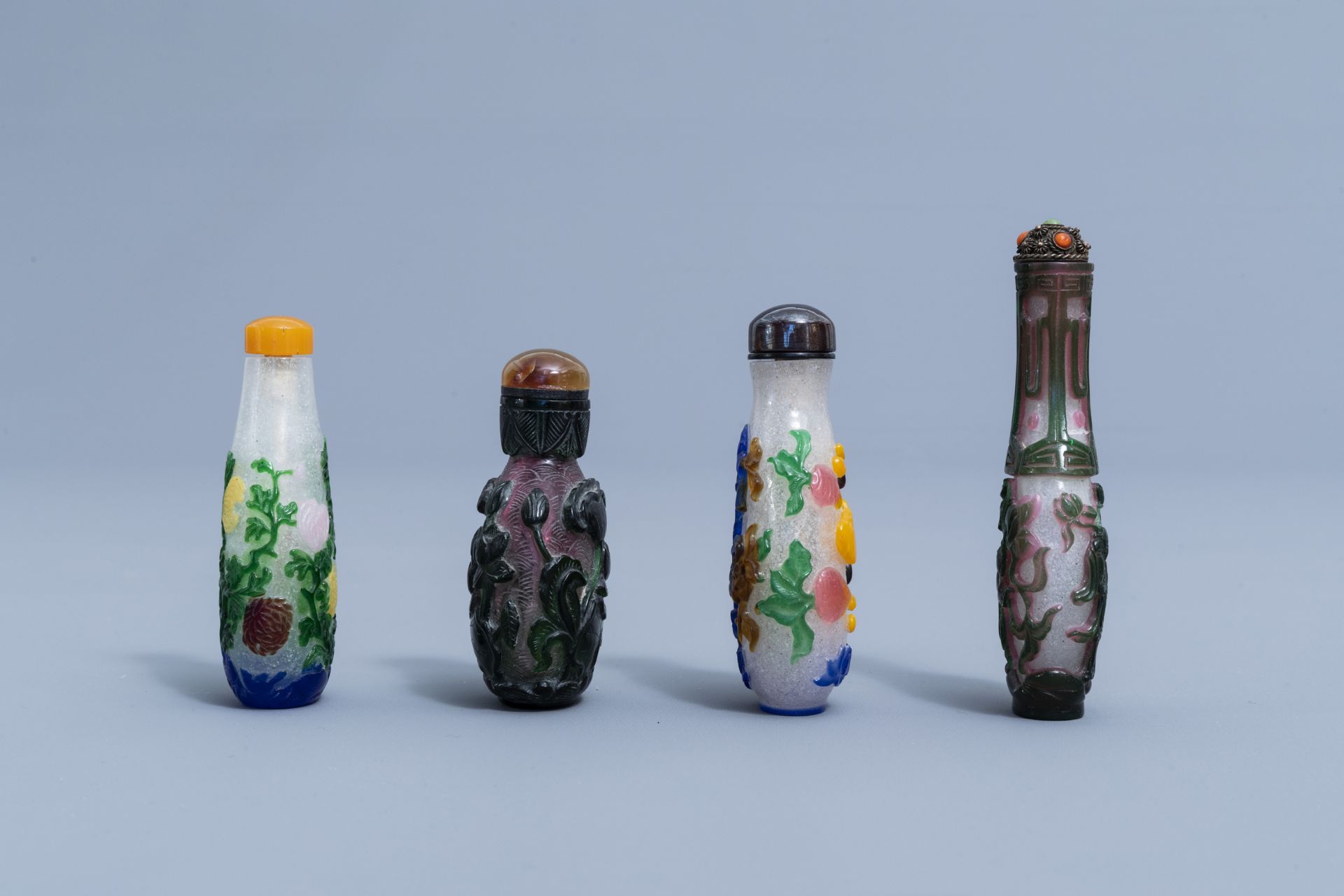 Eight Chinese multi-colour overlay glass snuff bottles, 20th C. - Image 2 of 4