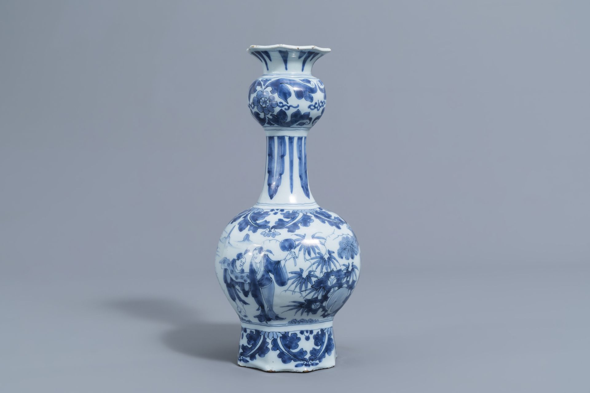 A Dutch Delft blue and white 'chinoiserie' garlic neck bottle vase, late 17th C. - Image 3 of 6