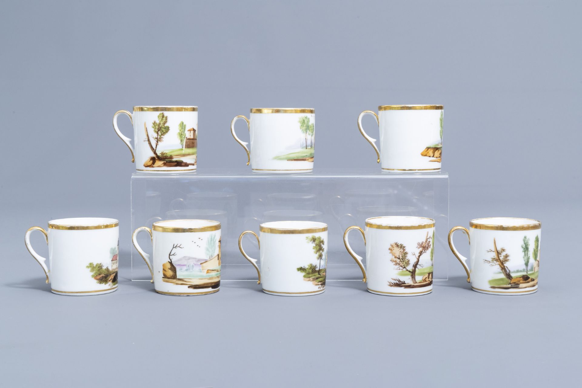 A 21-piece Paris polychrome and gilt porcelain coffee and tea service with landscapes, 19th C. - Image 38 of 46