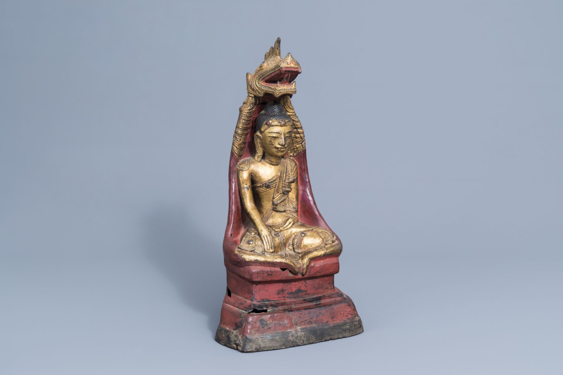 A large gilt, lacquered and polychrome Buddha with inlay, Burma or Laos, 19th/20th C. - Image 2 of 8