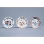 Three Chinese famille rose and iron red 'rooster' plates, Yongzheng/Qianlong