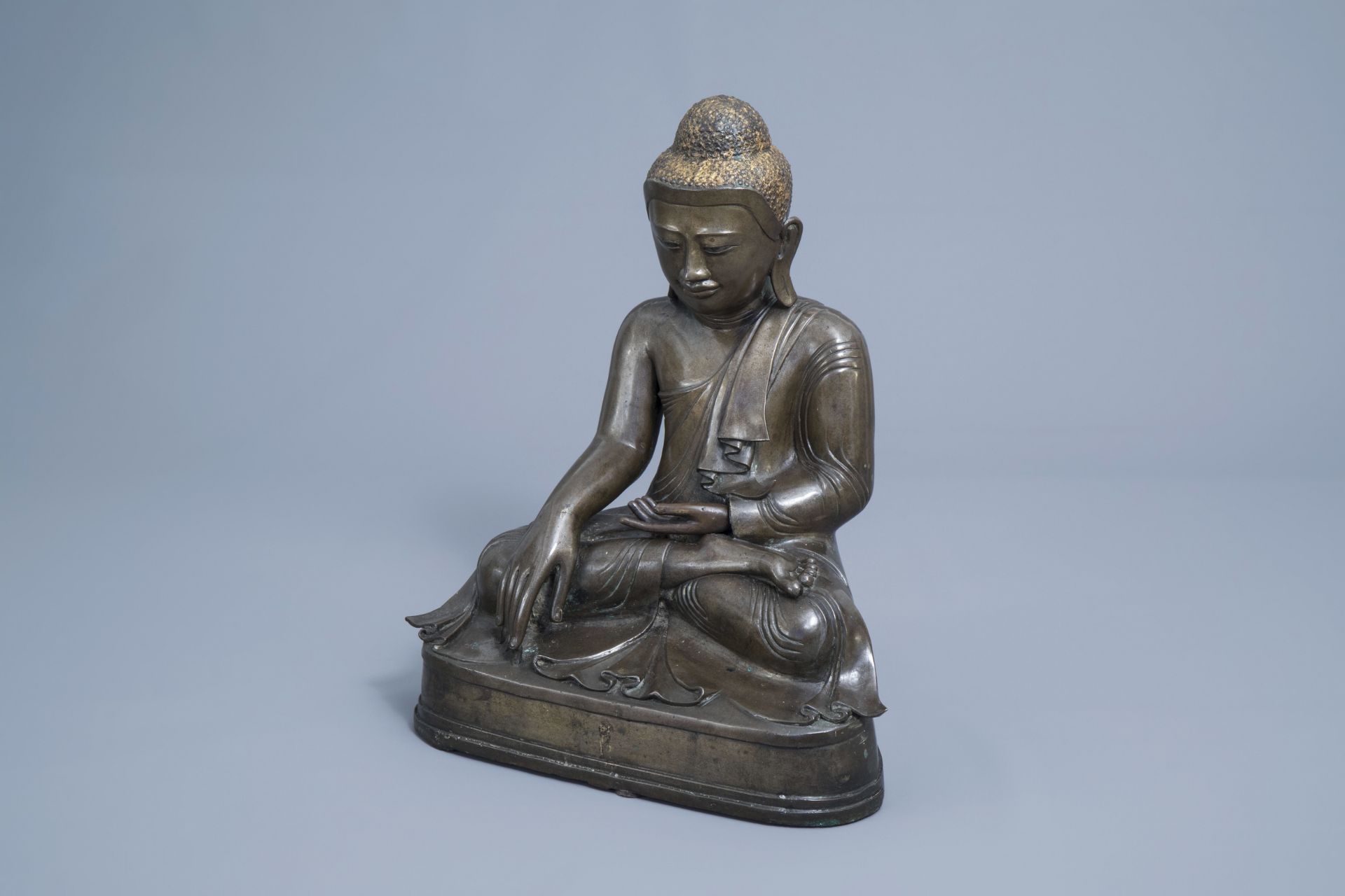 A large patinated and gilt bronze Buddha figure, Burma, Mandalay period, 19th C. - Image 2 of 7