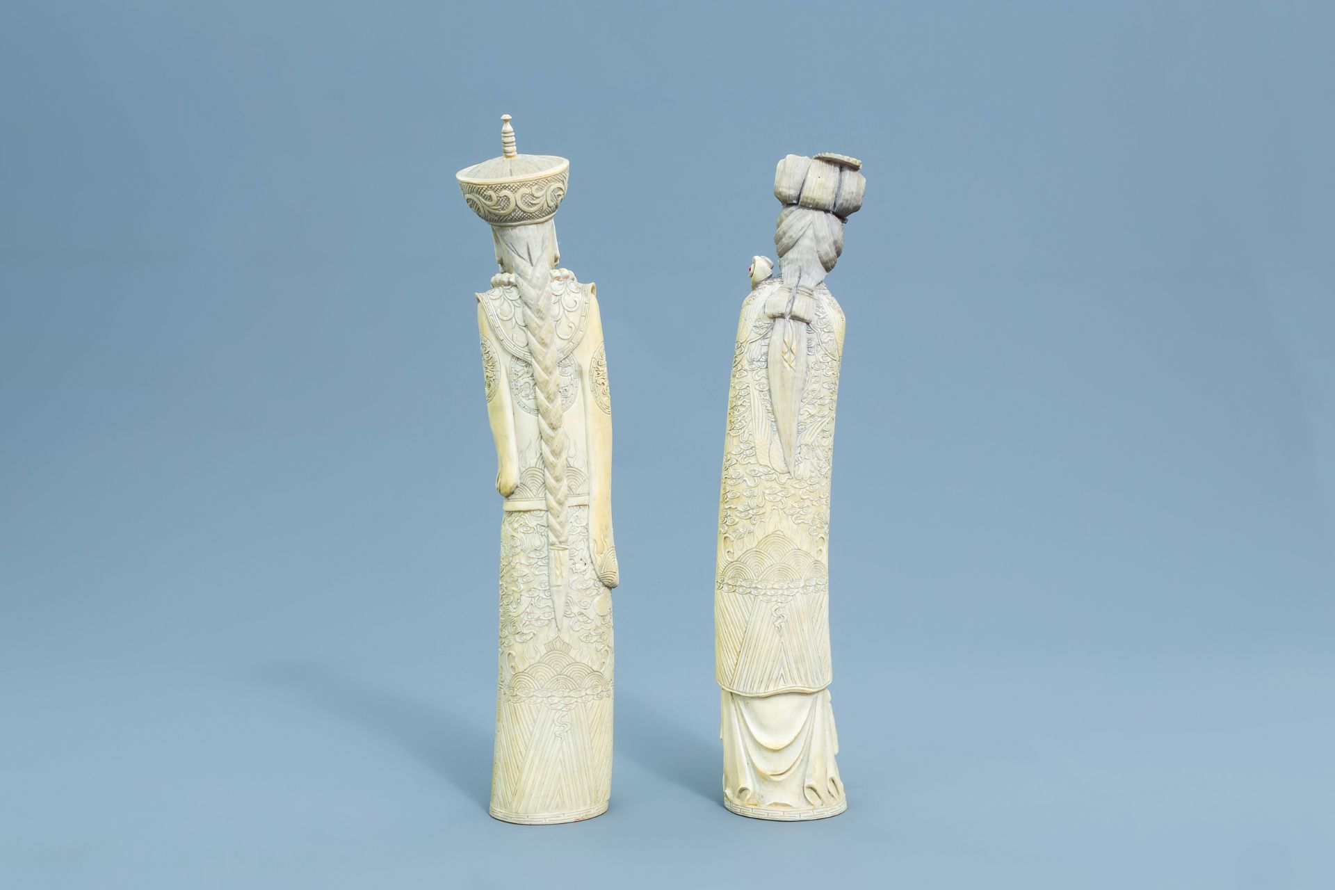 A pair of Chinese inlaid carved ivory figures of the emperor couple, first half of the 20th C. - Image 3 of 8