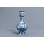 A Dutch Delft blue and white 'chinoiserie' garlic neck bottle vase, late 17th C.