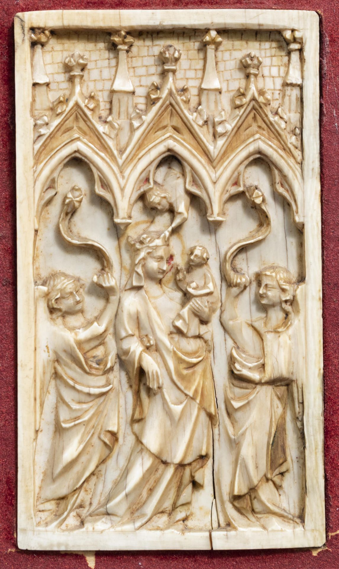 A French Gothic Revival carved ivory panel with the Coronation of the Virgin, 19th C.