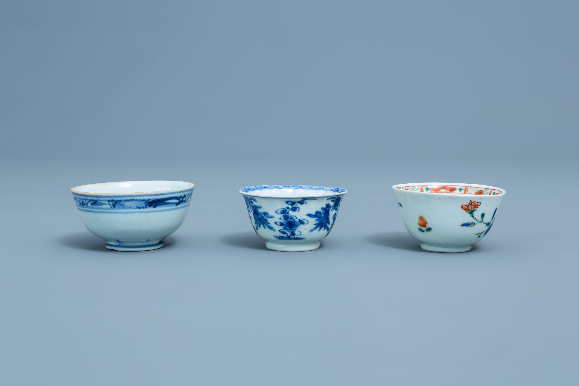 Three Chinese blue, white and famille rose cups and three saucers, Kangxi and later - Image 10 of 18