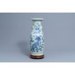 A Chinese blue and white celadon ground 'phoenix and qilin' vase, 19th C.