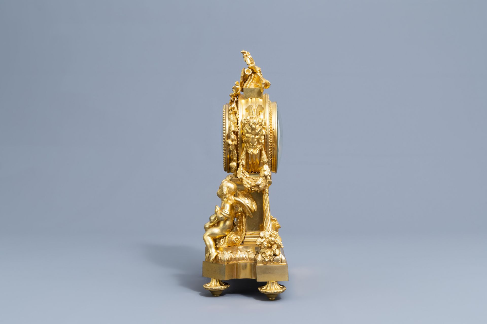 A French gilt bronze mounted Sevres style clock and a pair of Louis XV style candelabra, 19th C. - Image 8 of 23