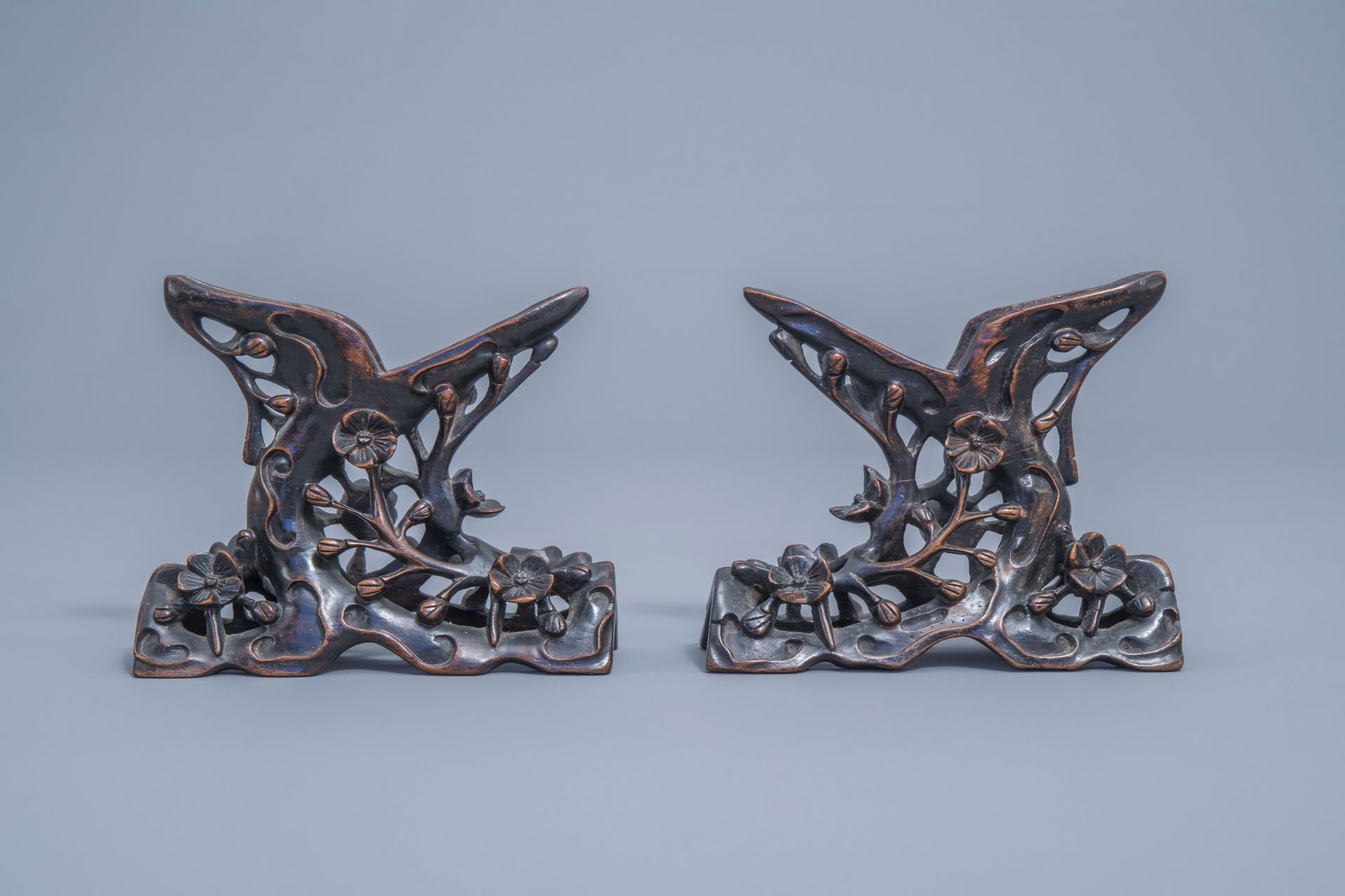 A pair of Chinese carved mother-of-pearl shells on wooden stands, 19th C. - Image 3 of 11