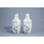 A pair of Chinese famille rose vases with birds and butterflies among flower branches, 19th/20th C.
