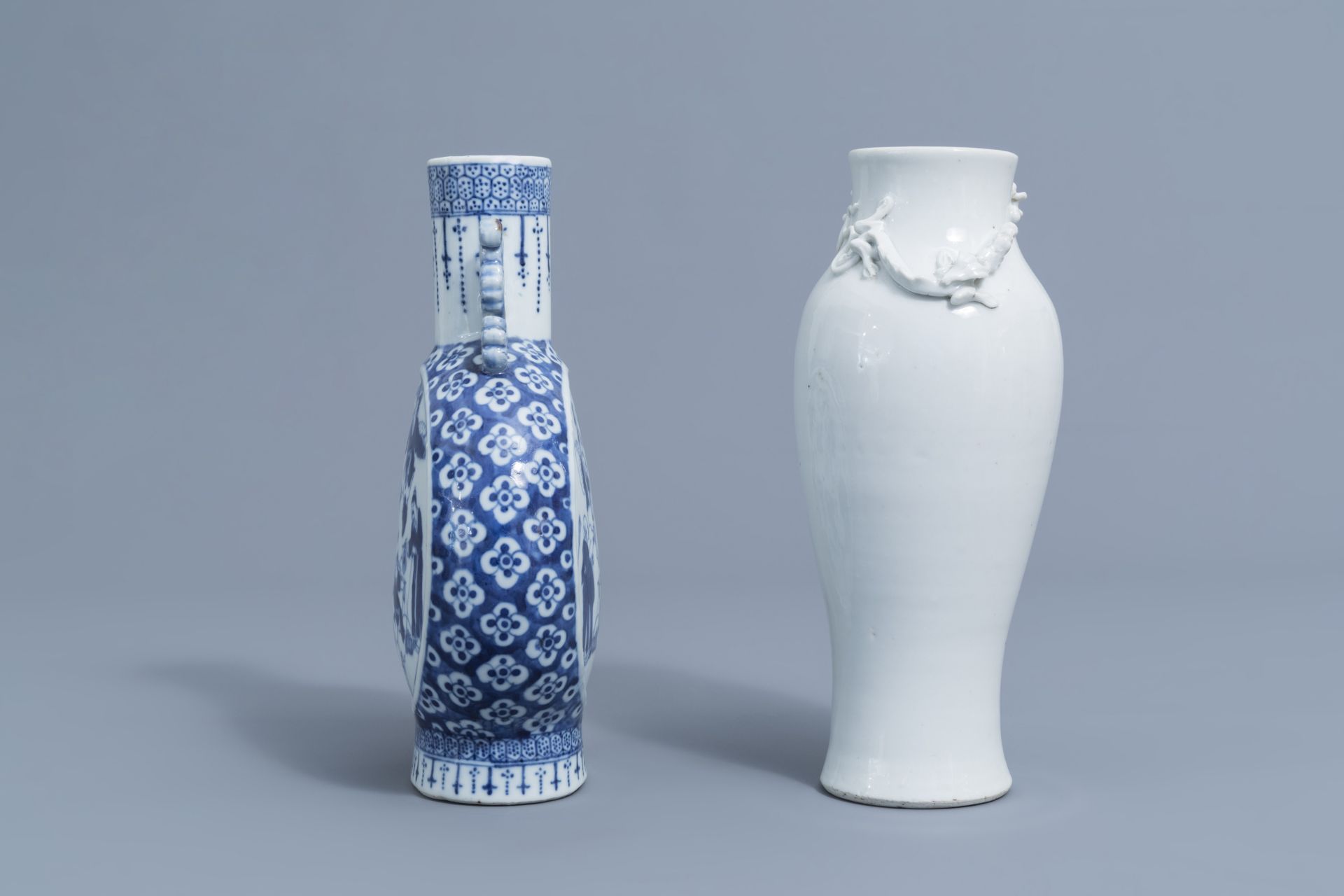 A Chinese blue and white moonflask and a blanc de Chine vase with dragon relief design, 19th C. - Image 2 of 6
