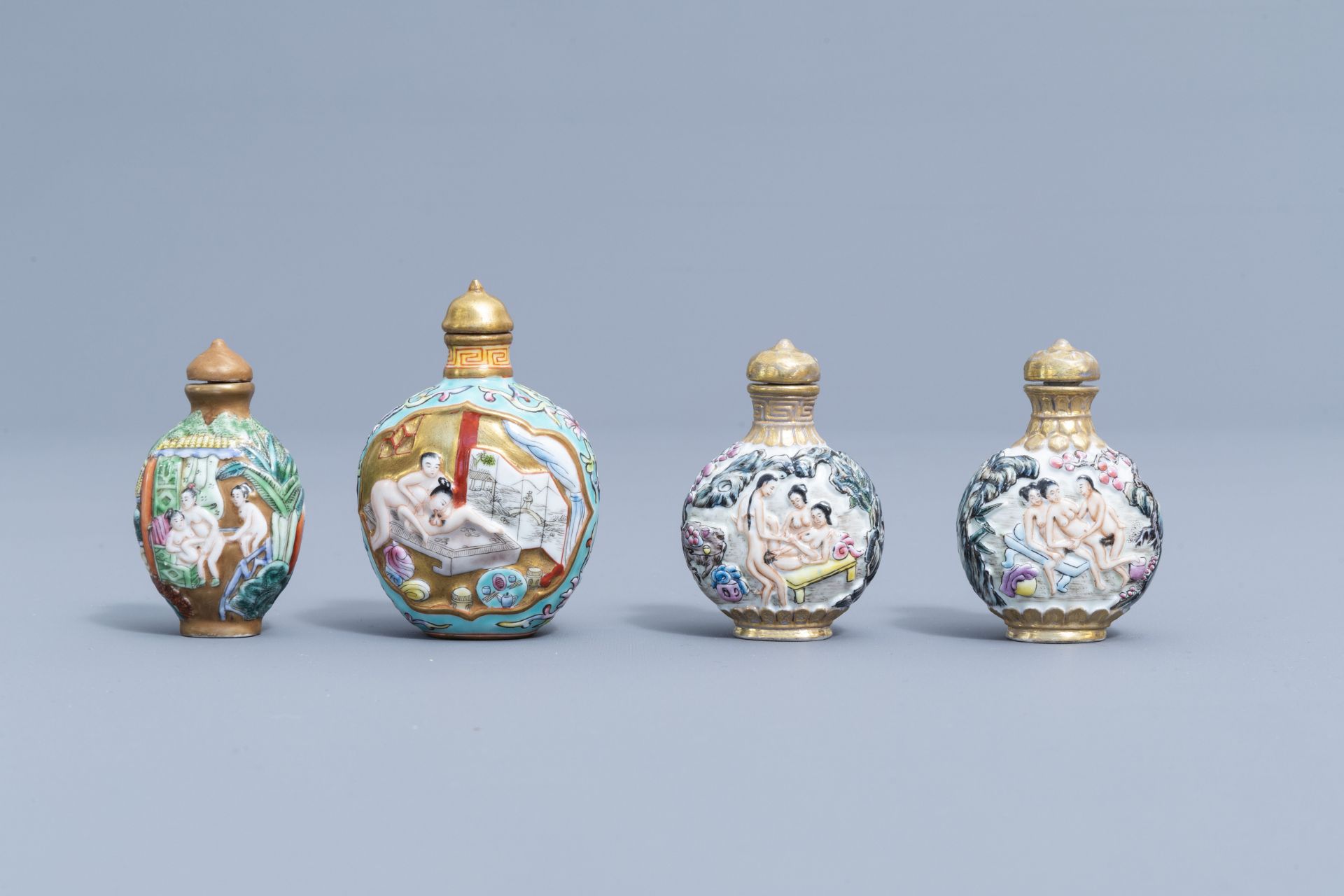 Eight Chinese erotical porcelain, glass and Canton enamel snuff bottles, 20th C. - Image 3 of 4