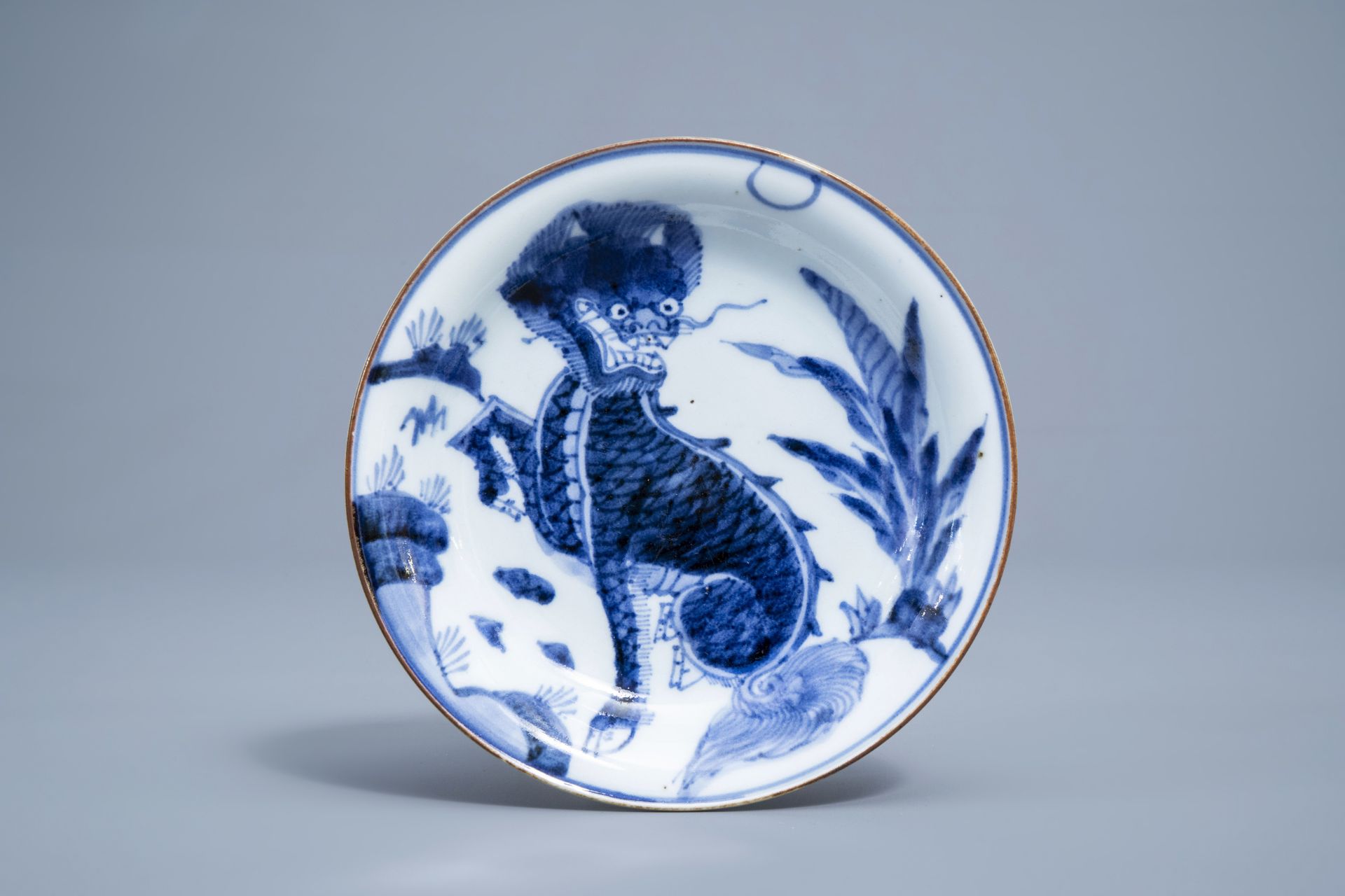 A pair of Japanese blue and white 'komainu' saucer dishes, marked, Edo, 18th C. - Image 2 of 5