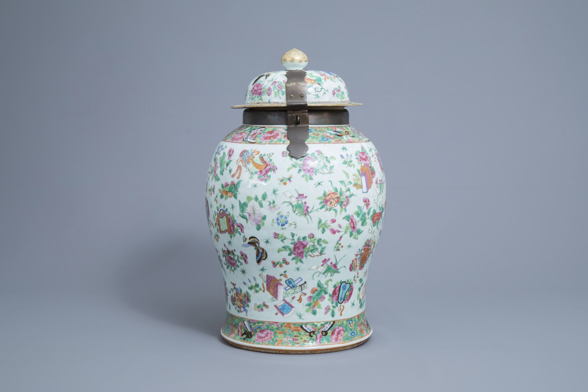 A large Chinese Canton famille rose vase and cover with antiquities, 19th C.