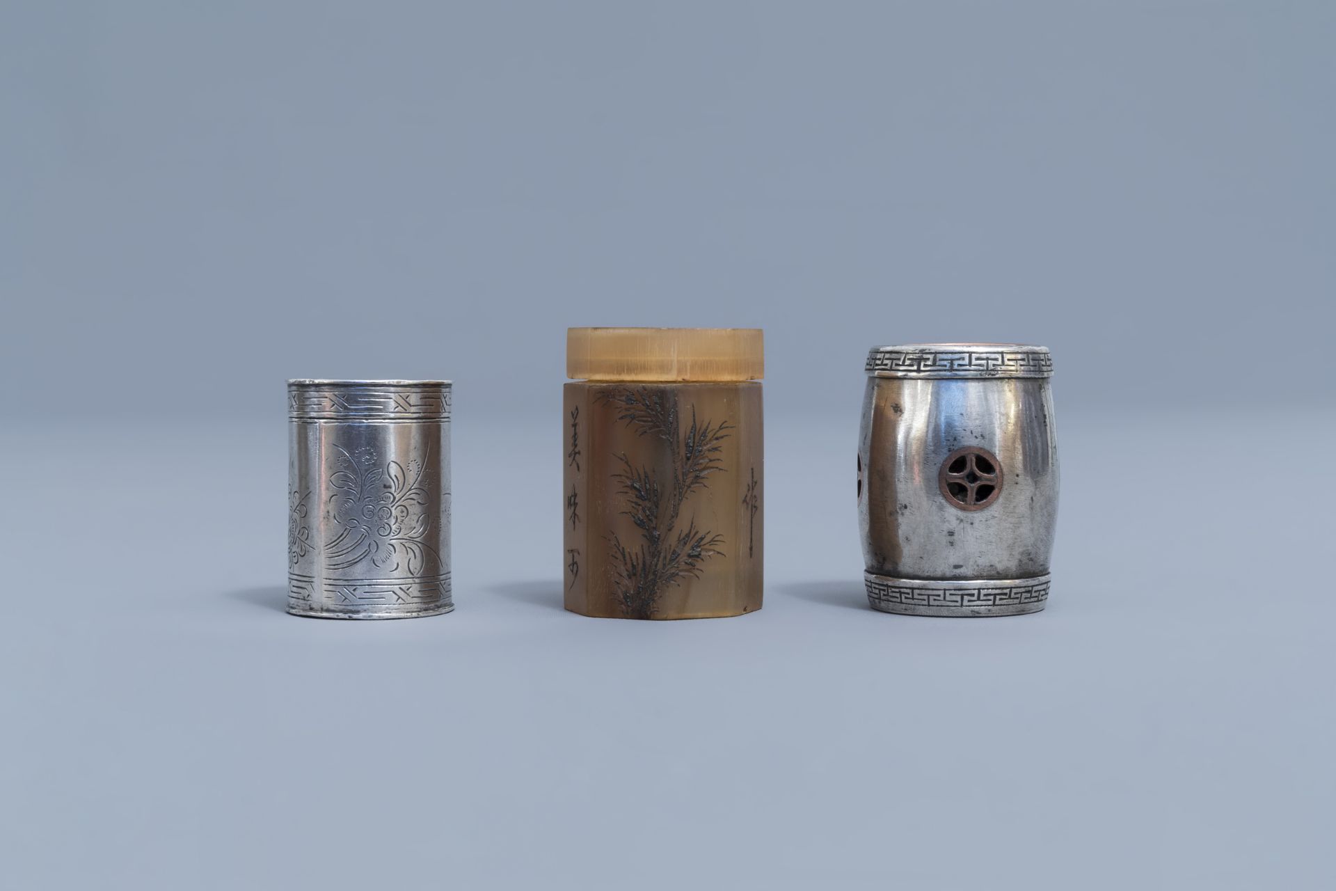 A collection of five silver, paktong, brass and horn opium boxes and covers, 19th/20th C. - Image 2 of 15