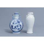 A Chinese blue and white moonflask and a blanc de Chine vase with dragon relief design, 19th C.